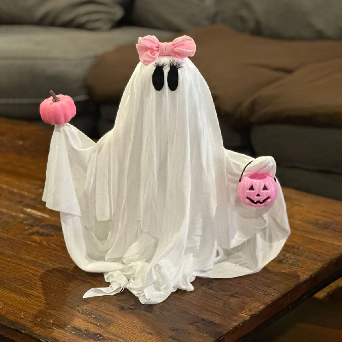 Ghost Holding Pink Pumpkin Halloween